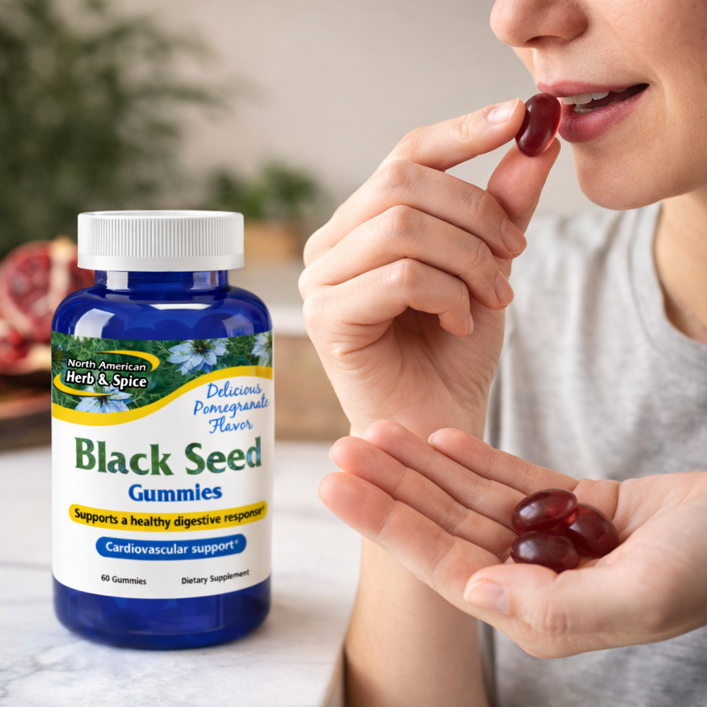 Person taking Black Seed Gummies beside the bottle